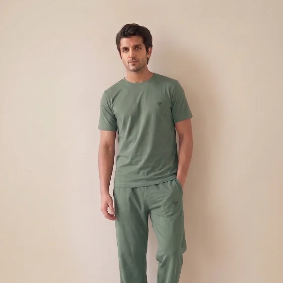 Man wearing a sage green summer lounge wear set for casual everyday comfort