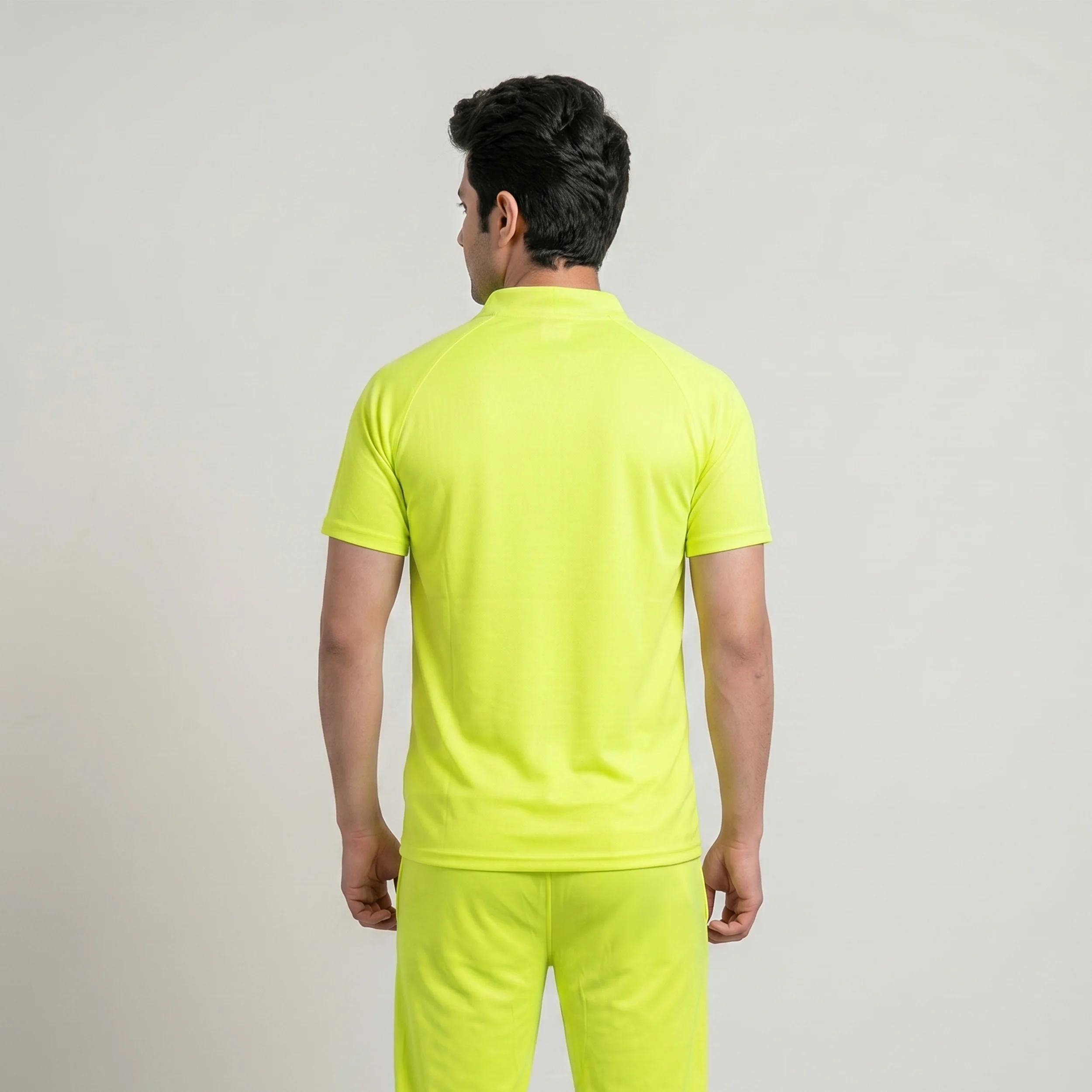 Back view of men's neon yellow casual co-ord set