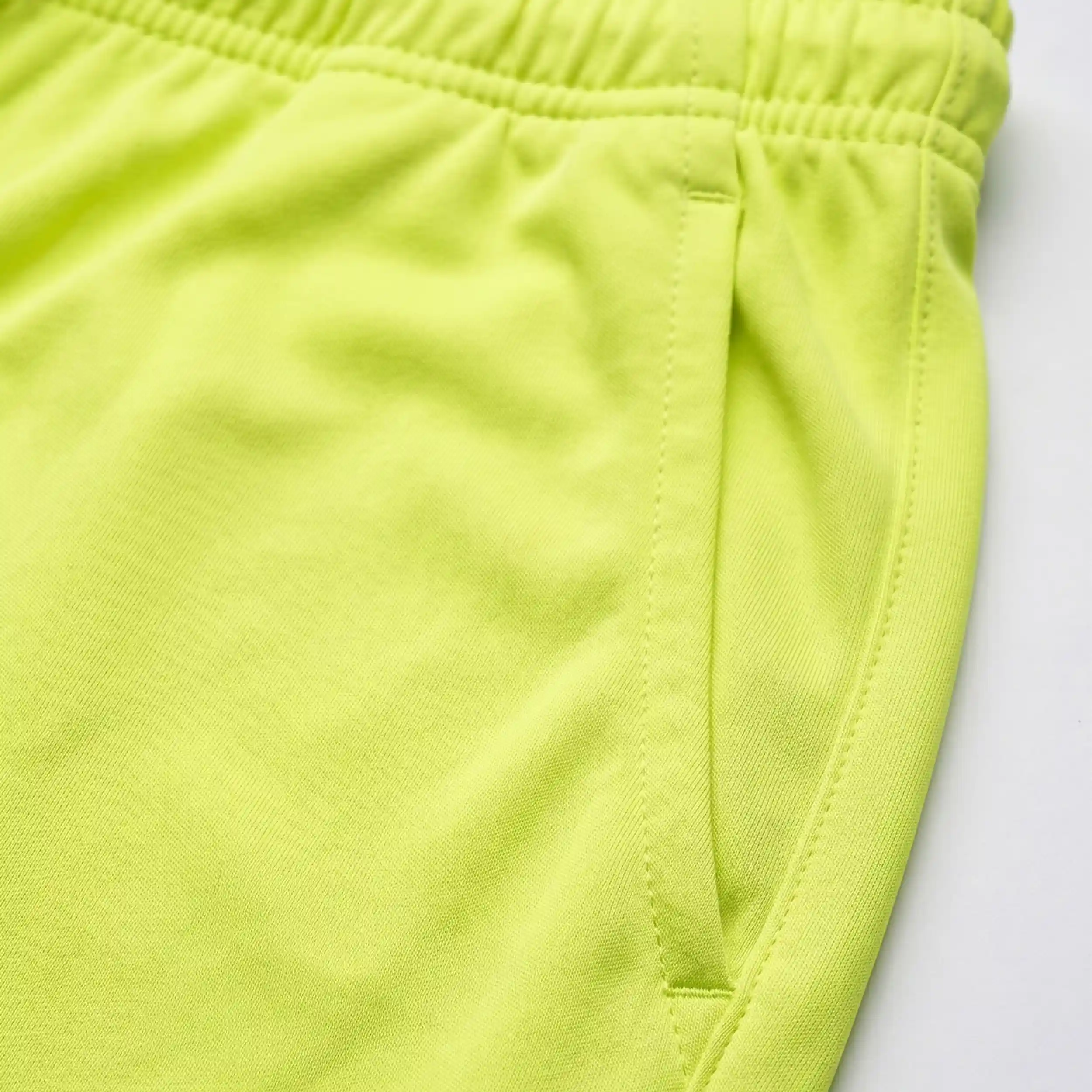 Neon yellow casual trouser pocket detail