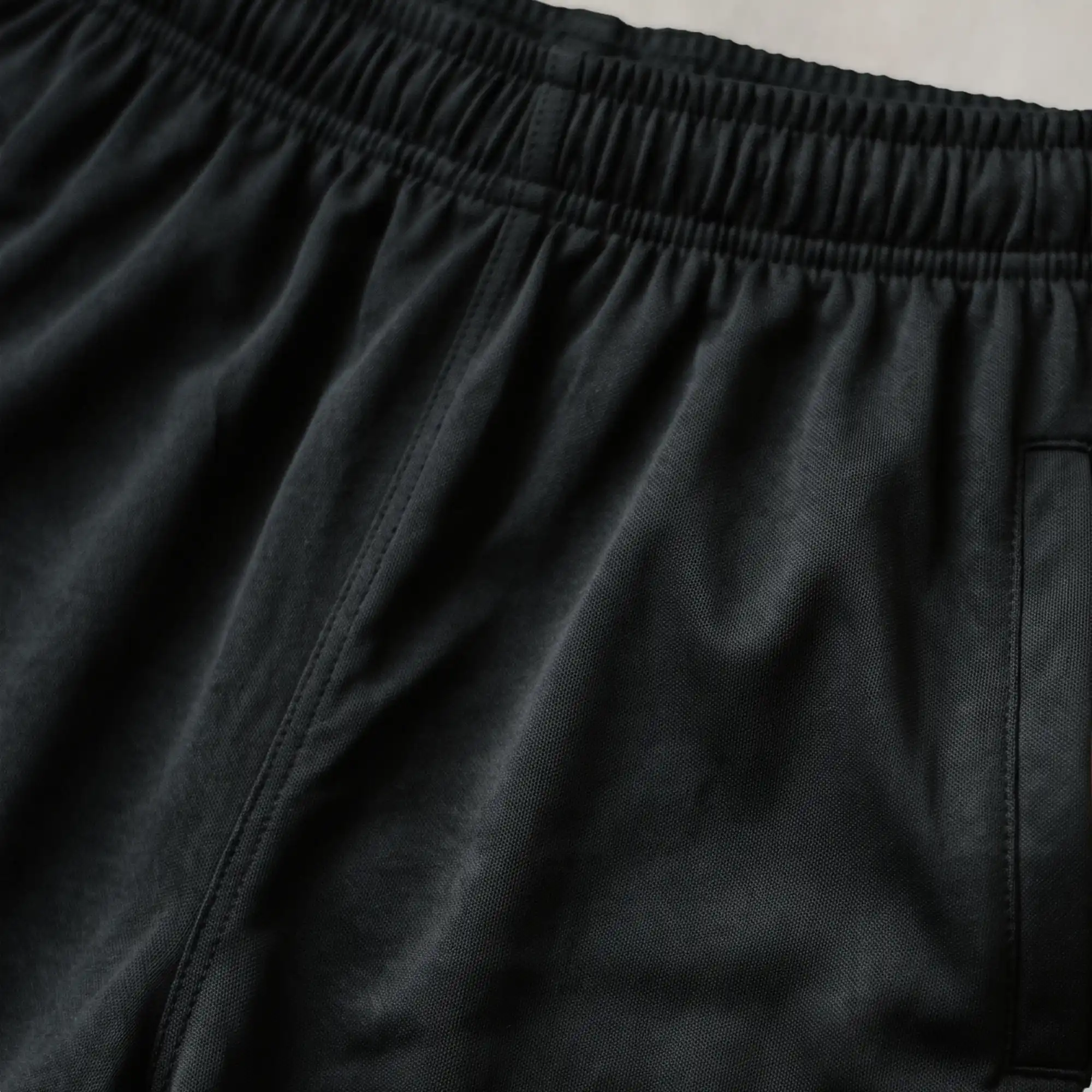 Women's black polyester interlock casual trousers with side pockets