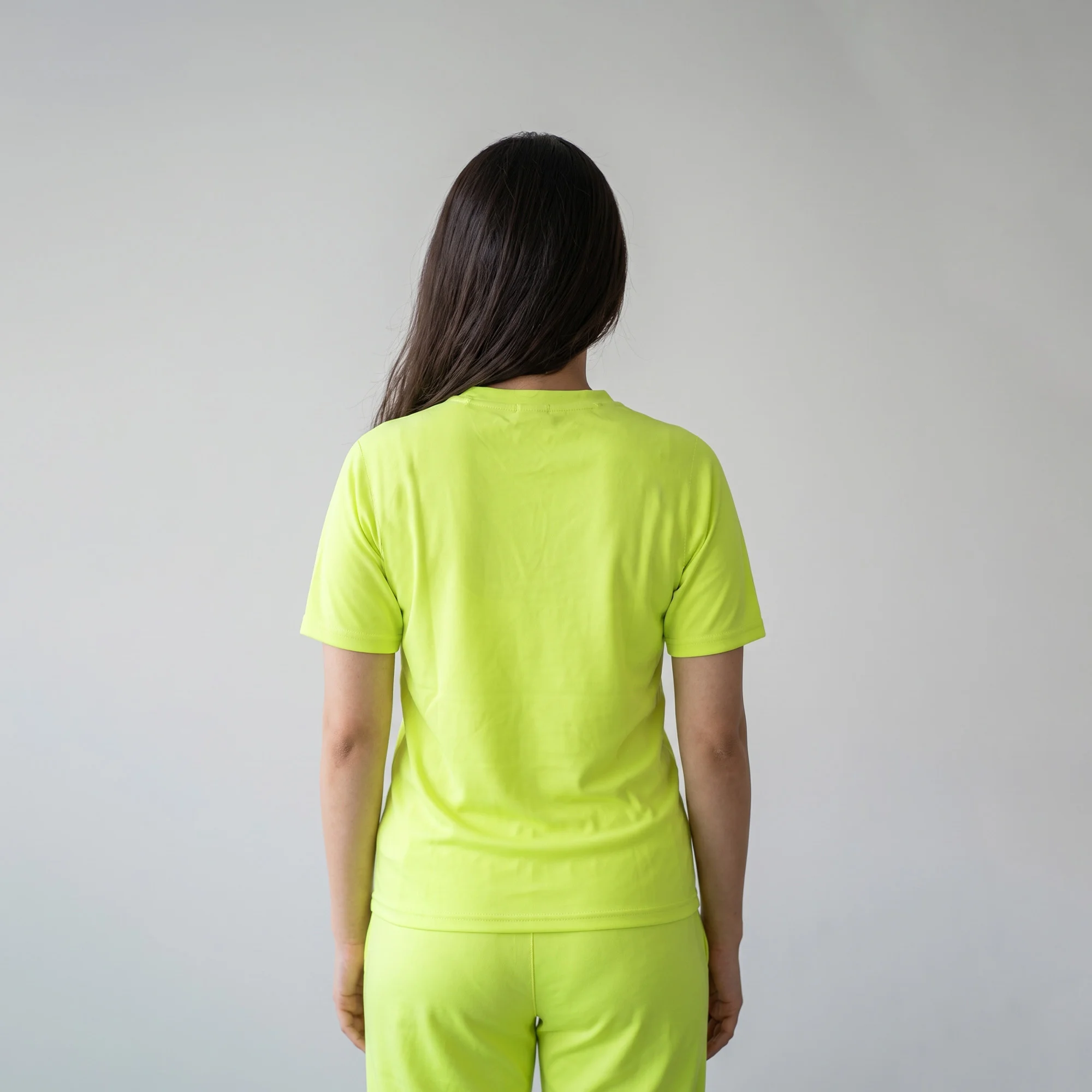 Back view of women's neon yellow casual co-ord set