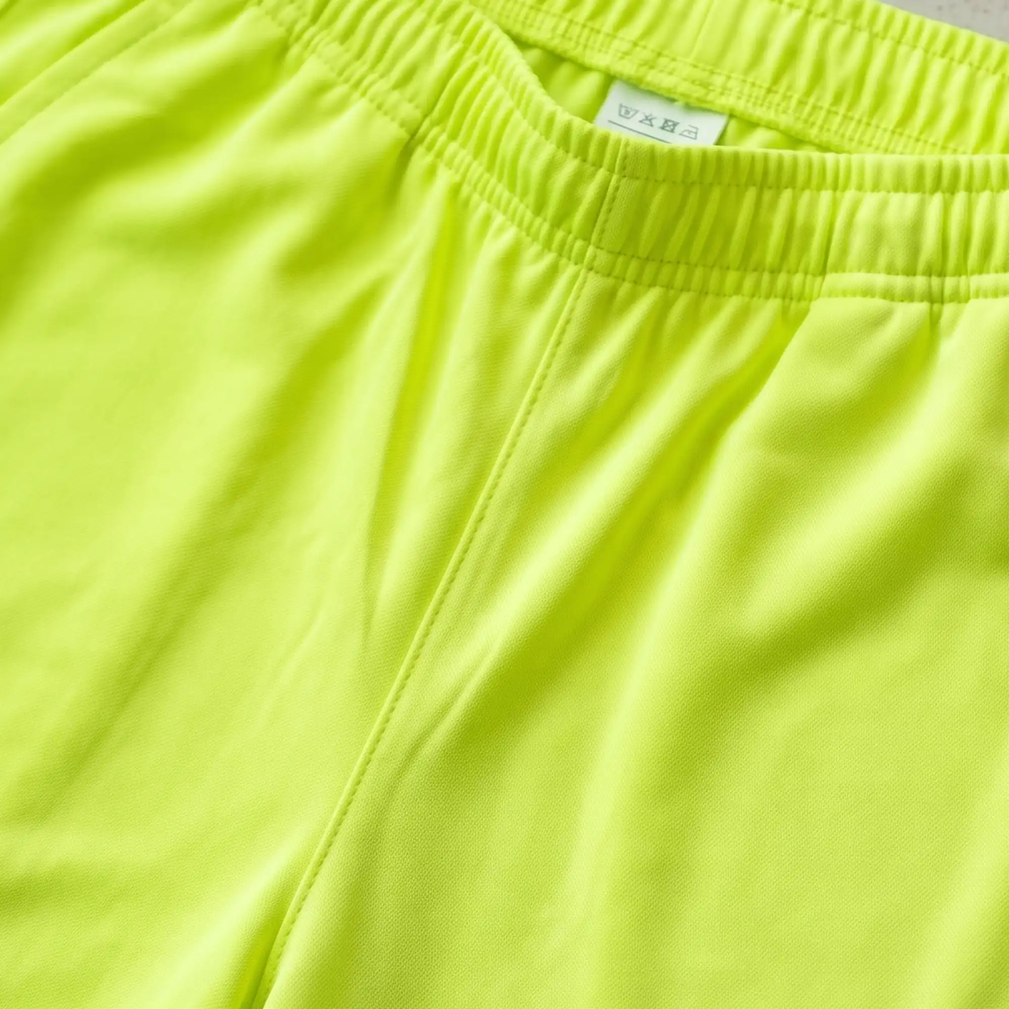 Women's neon yellow polyester interlock casual trousers detail